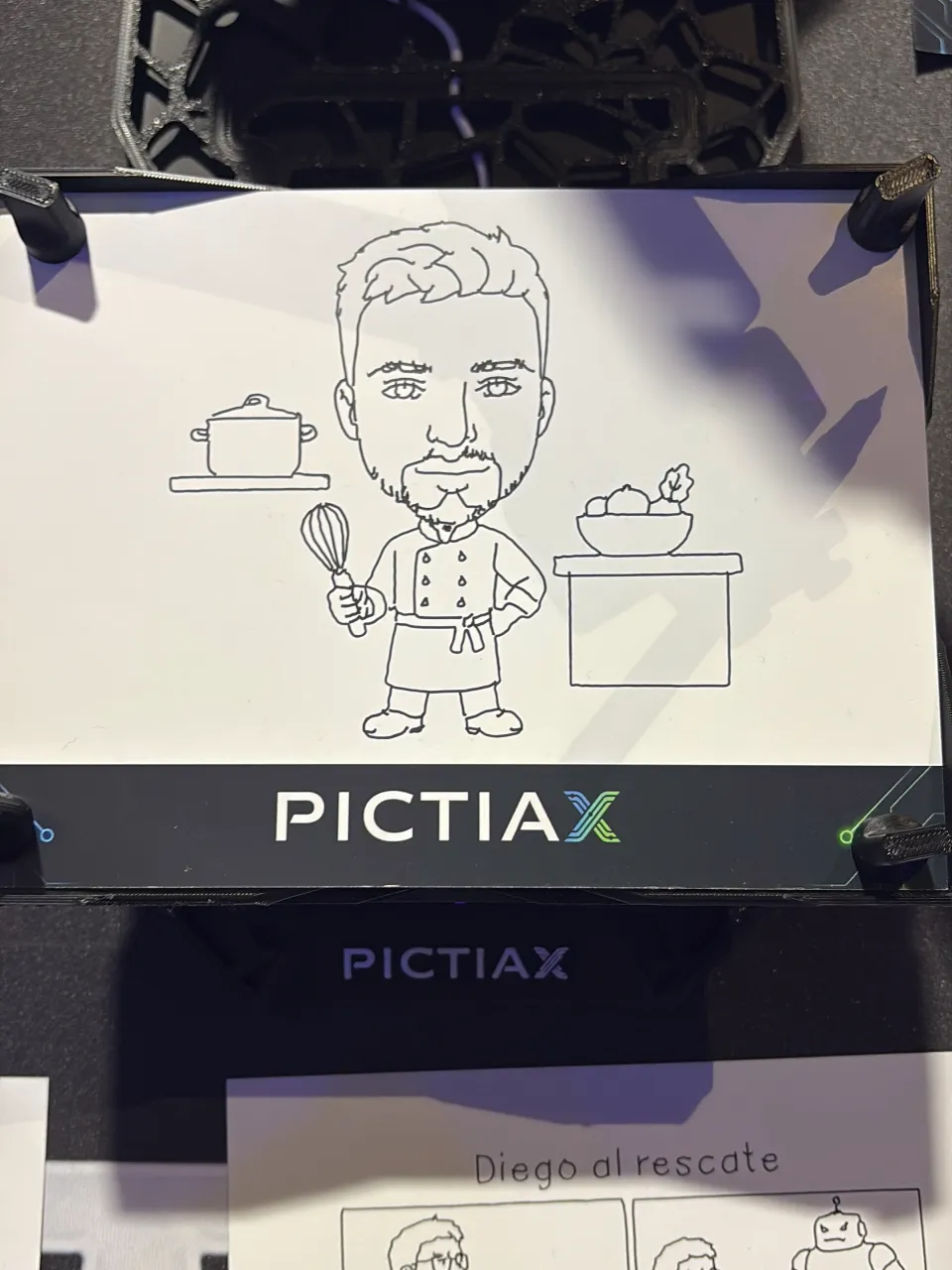 Continuous-line caricature of a person dressed as a chef, finished on the base of the PictiaX® caricature robot